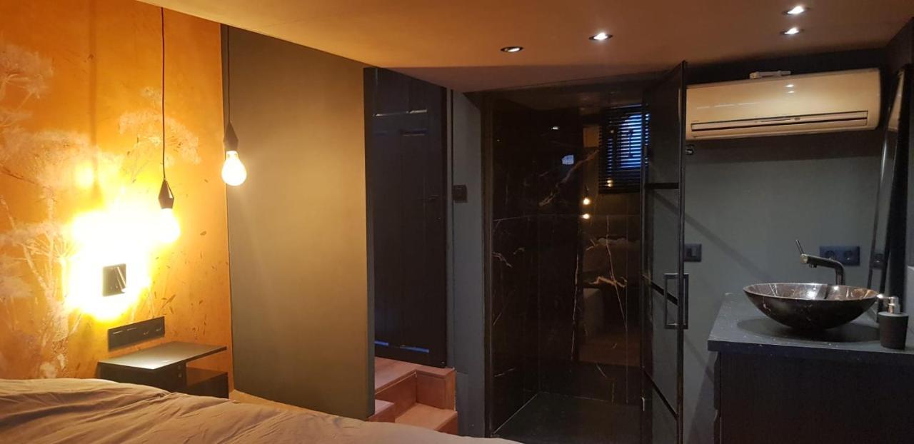 Euphrate Houseboat Hotel Amsterdam Bagian luar foto